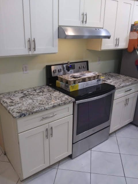 Completed kitchen cabinet and countertop installation