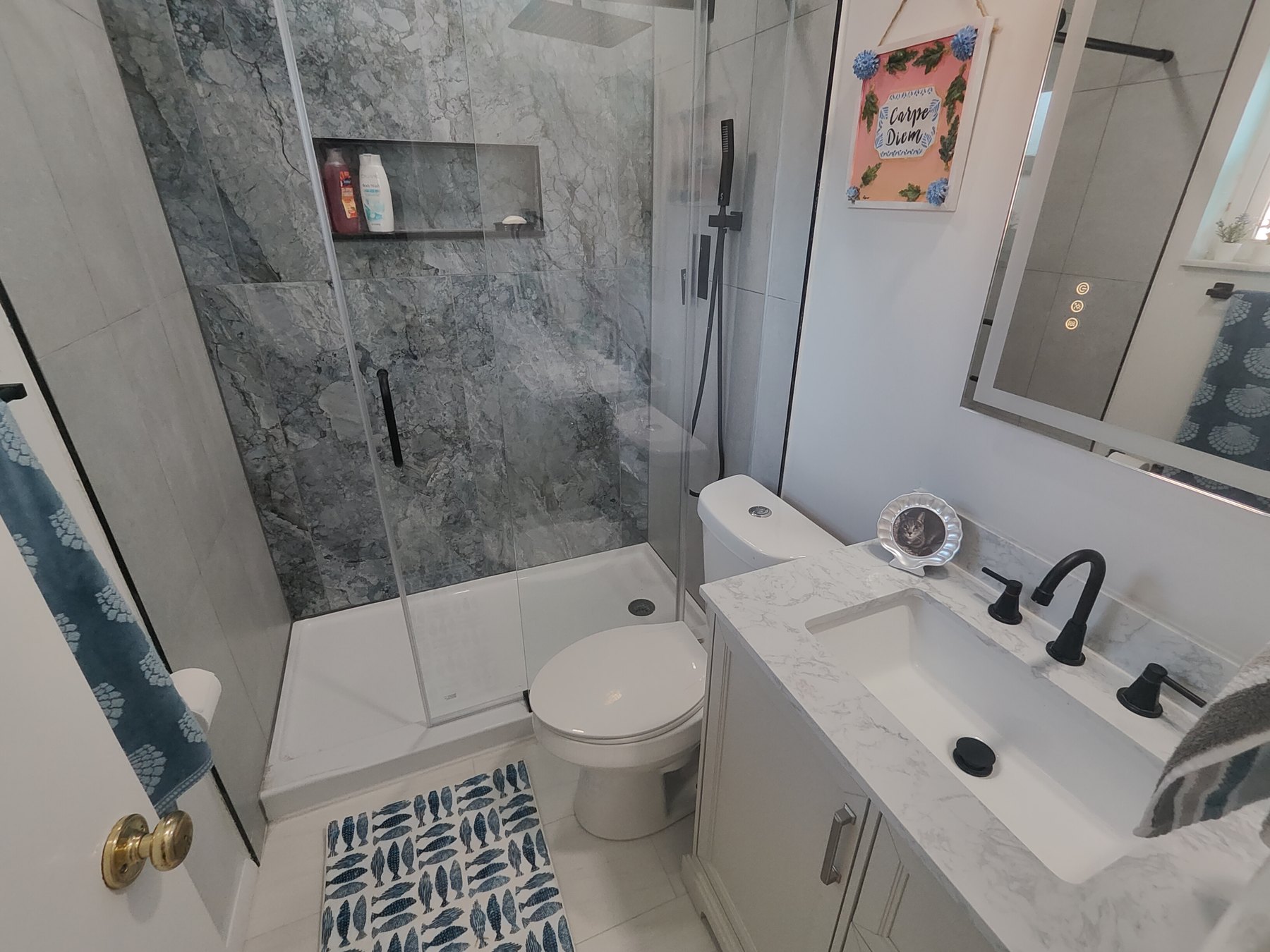 Completed tub-to-shower bathroom remodel