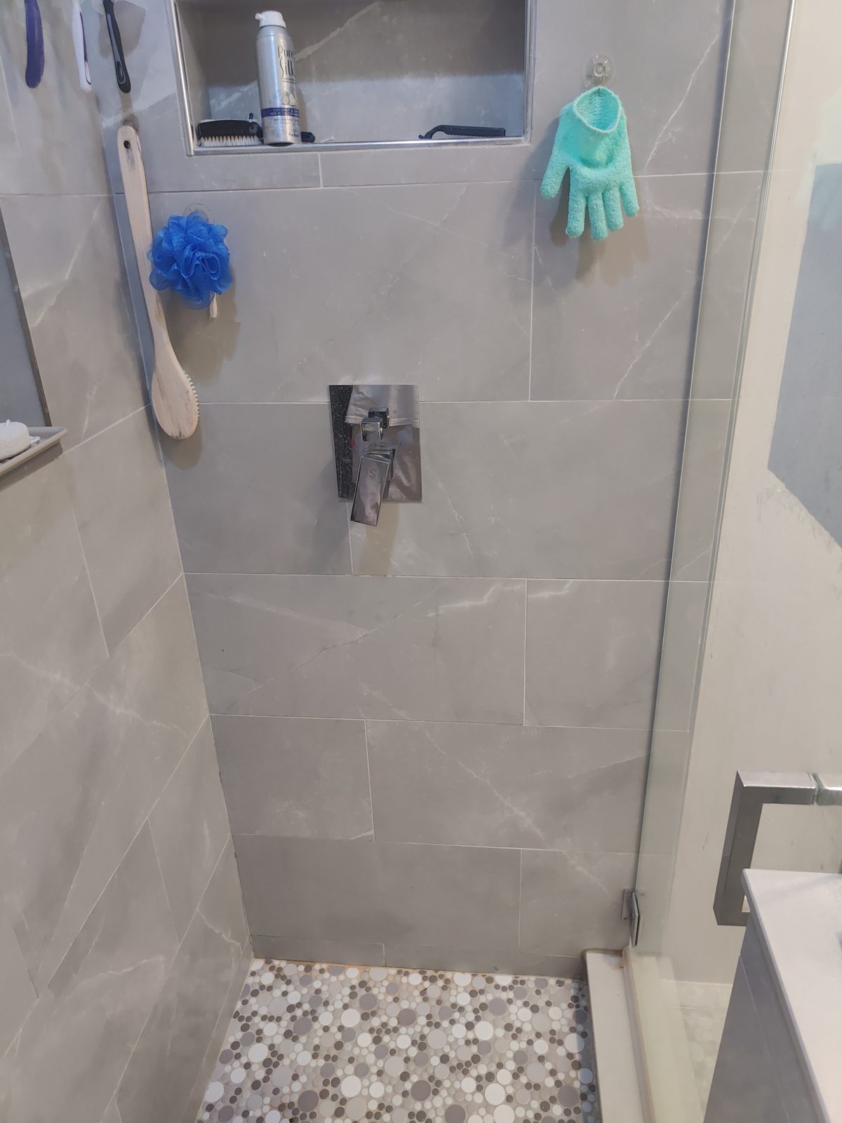 Large-format shower wall tile