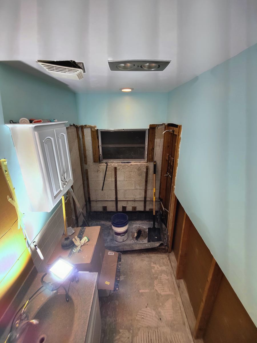 Bathroom rebuild, tile and finish work