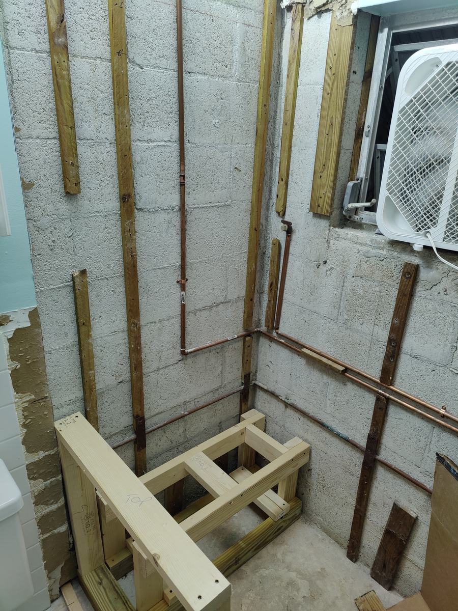 Bathroom rebuild, tile and finish work