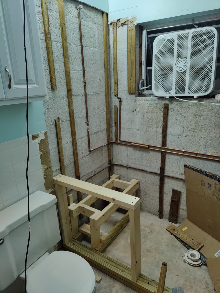 Bathroom rebuild, tile and finish work