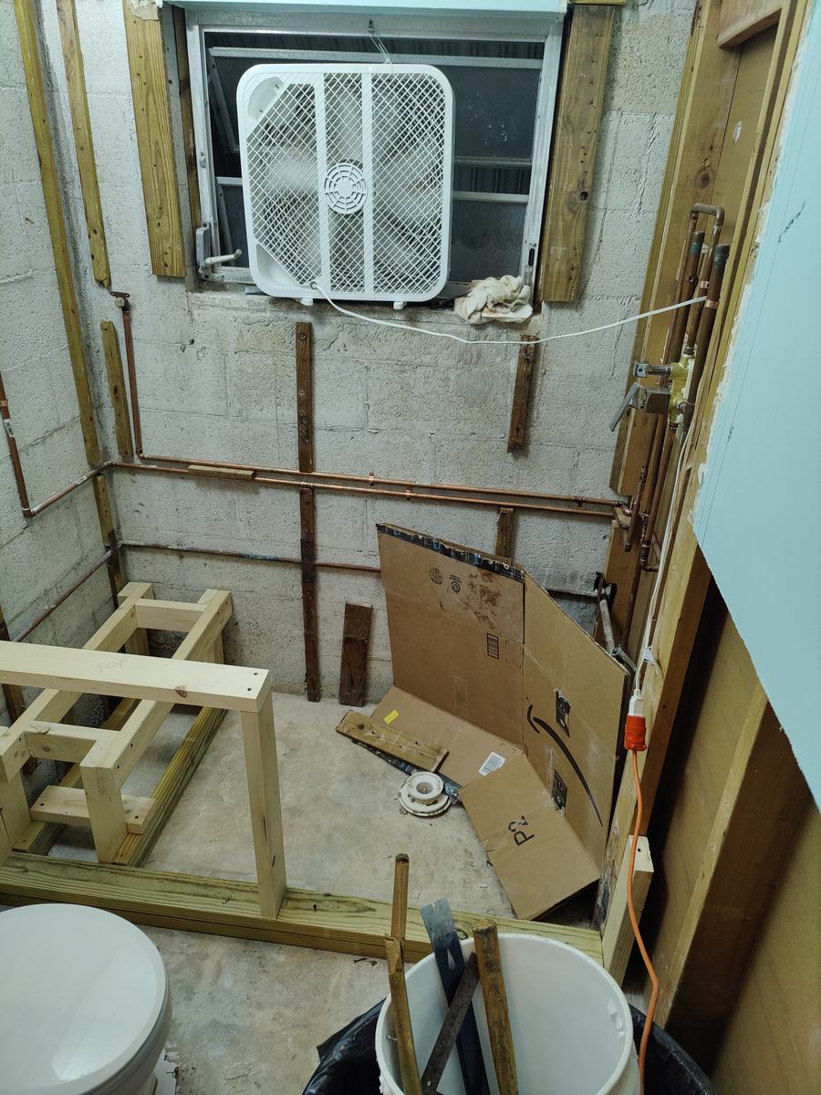 Bathroom rebuild, tile and finish work