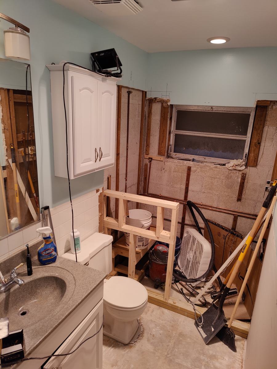 Bathroom rebuild, tile and finish work