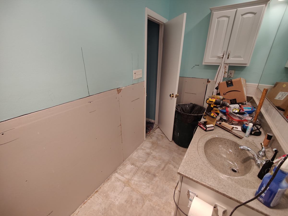 Bathroom rebuild, tile and finish work