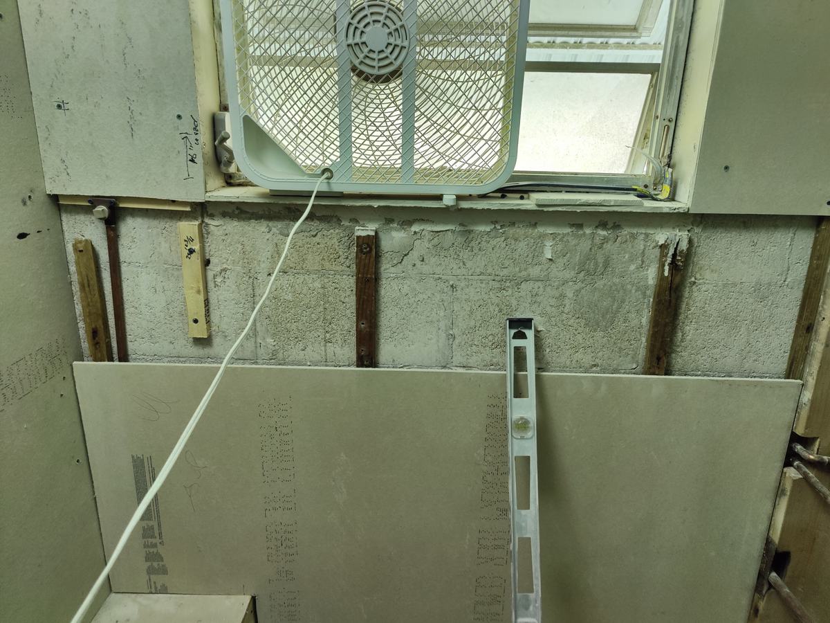 Bathroom rebuild, tile and finish work