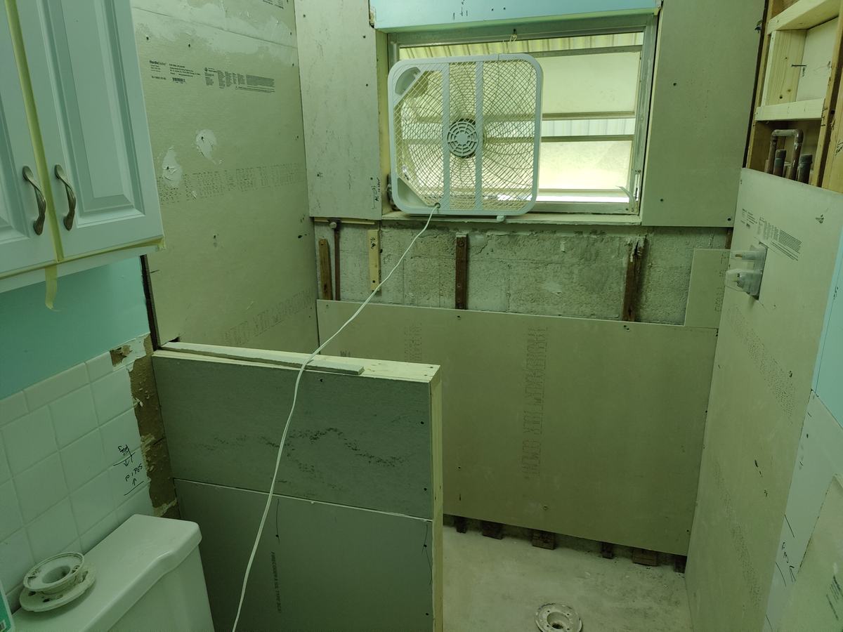 Bathroom rebuild, tile and finish work