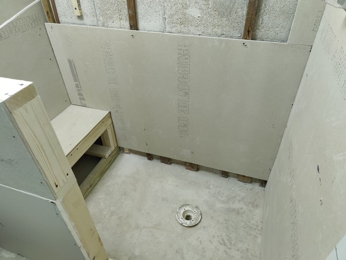 Bathroom rebuild, tile and finish work