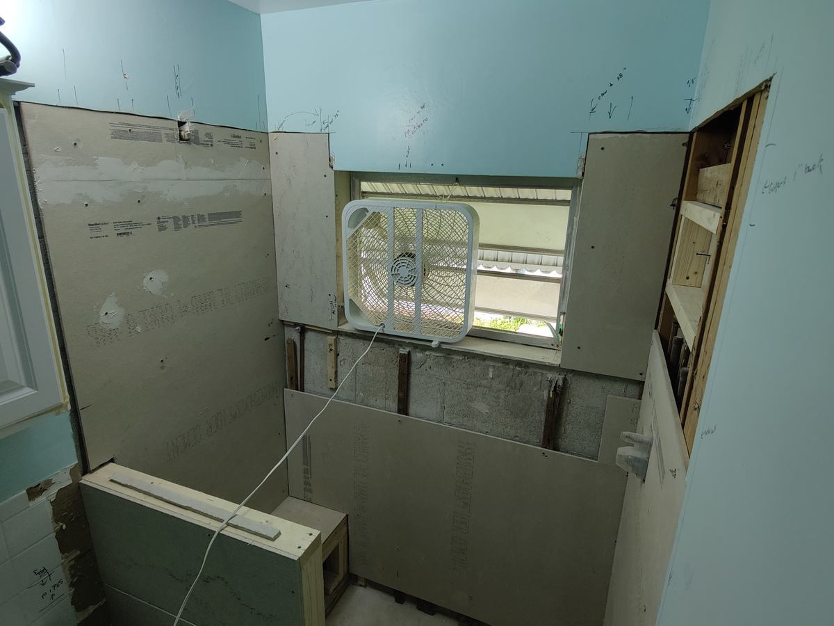 Bathroom rebuild, tile and finish work