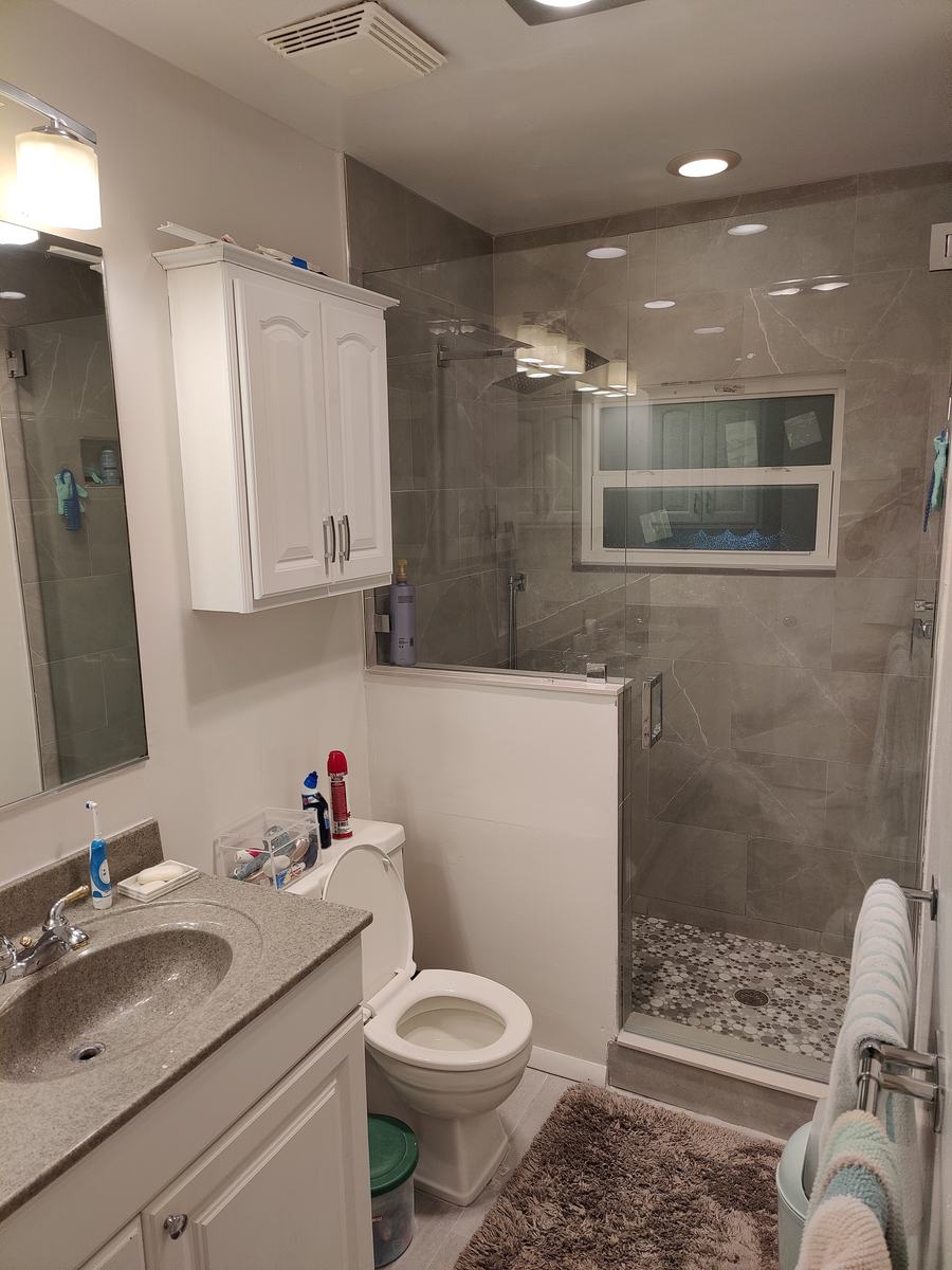 Bathroom rebuild, tile and finish work