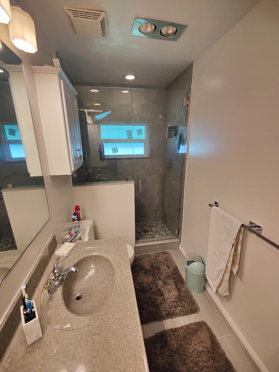 Bathroom rebuild, tile and finish work