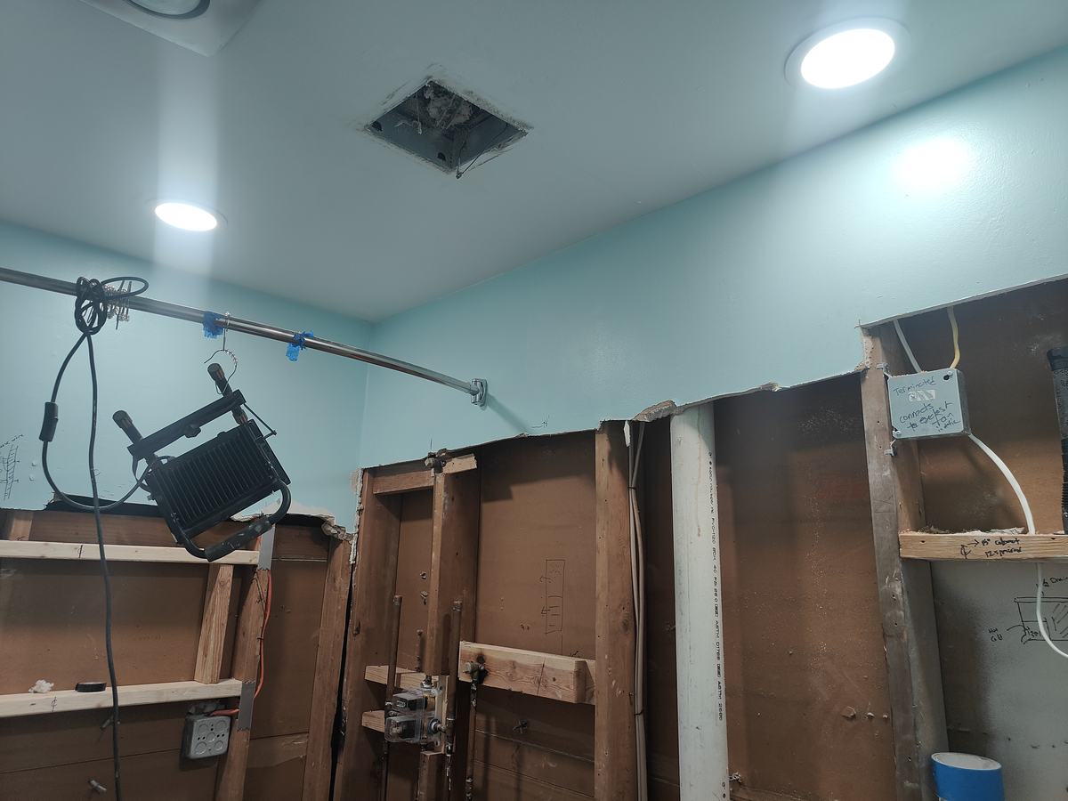 Bathroom remodel — open-wall rebuild phase