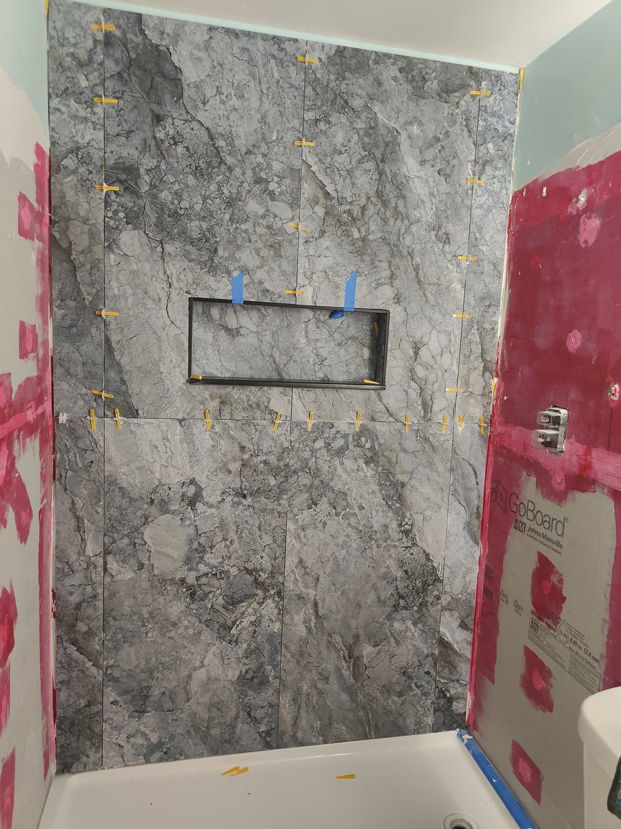 Bathroom remodel — tile installation and finishing