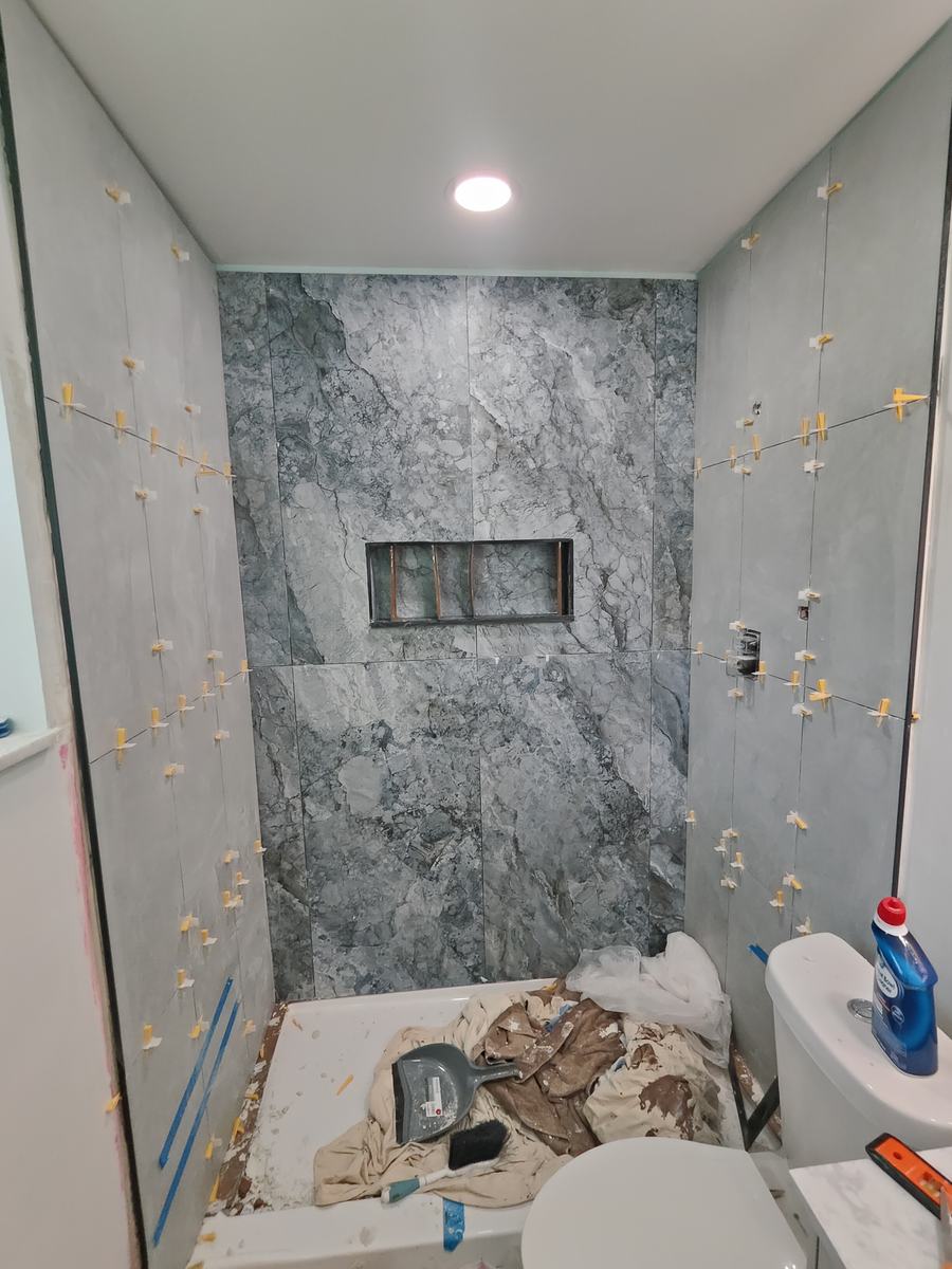 Bathroom remodel — tile installation and finishing