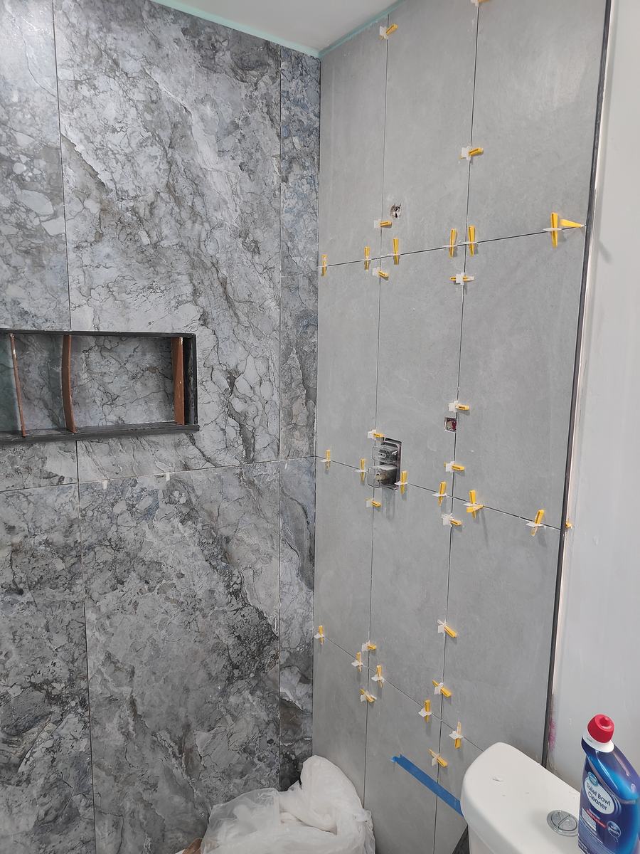 Bathroom remodel — tile installation and finishing