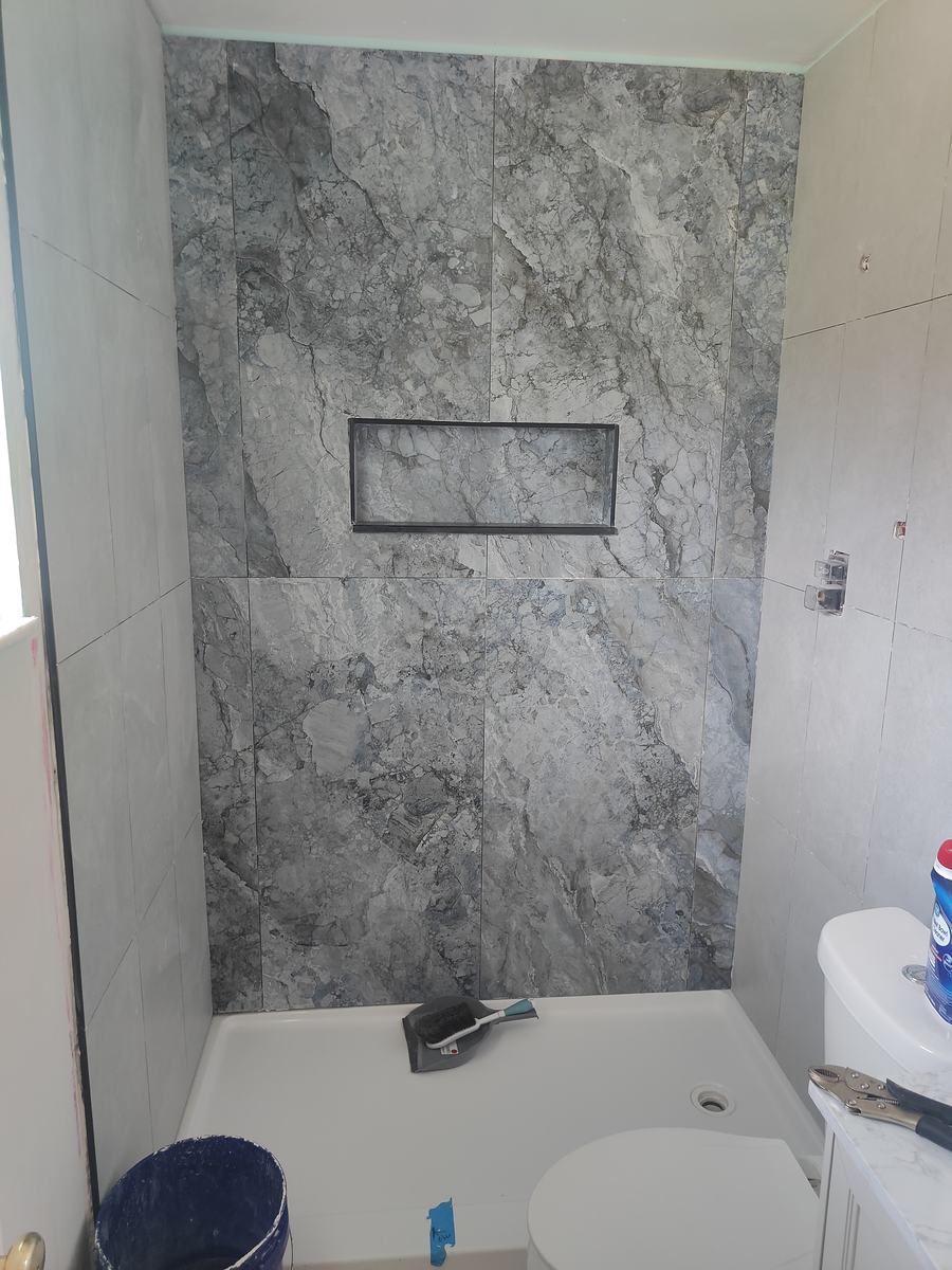 Bathroom remodel — tile installation and finishing