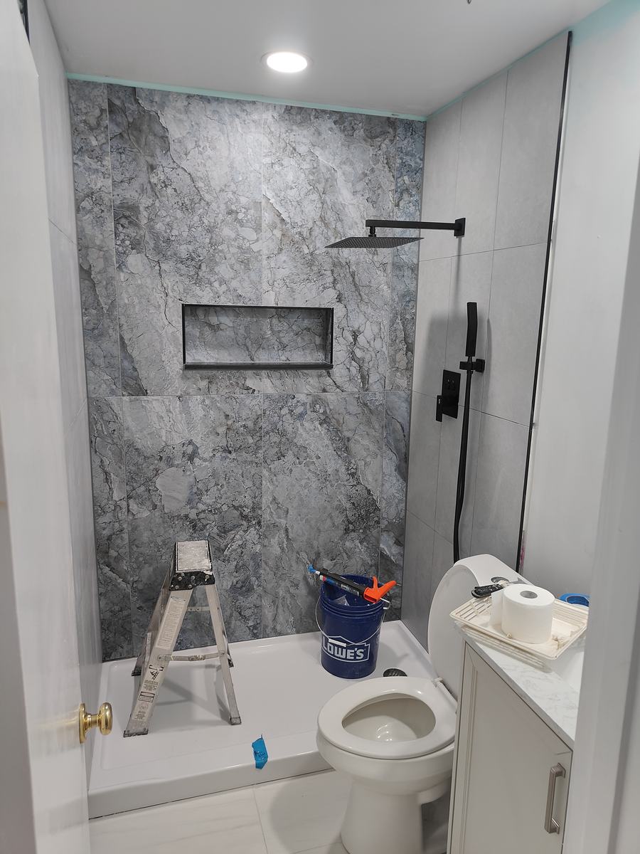 Bathroom remodel — tile installation and finishing