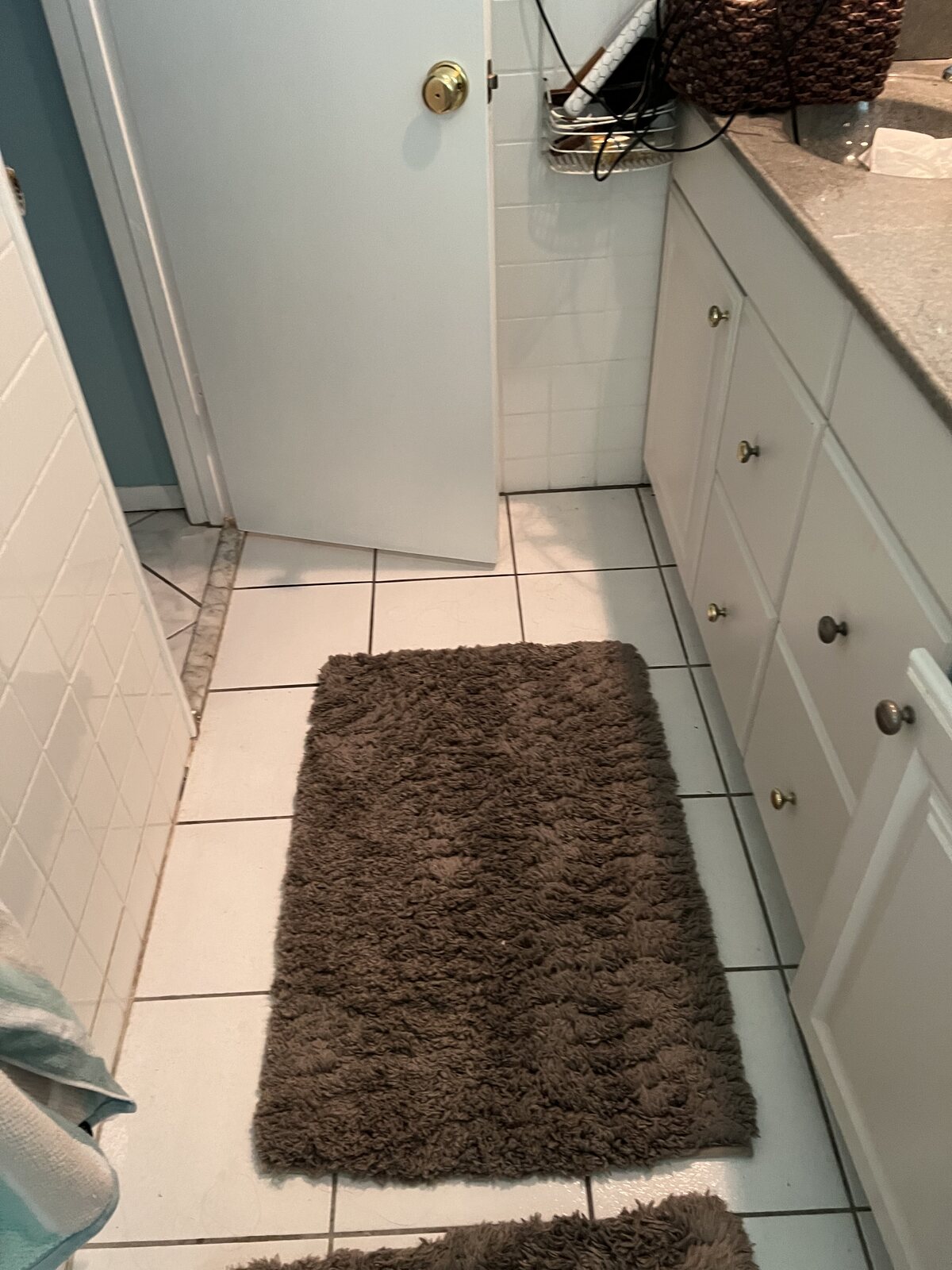 Bathroom before – flooring and vanity