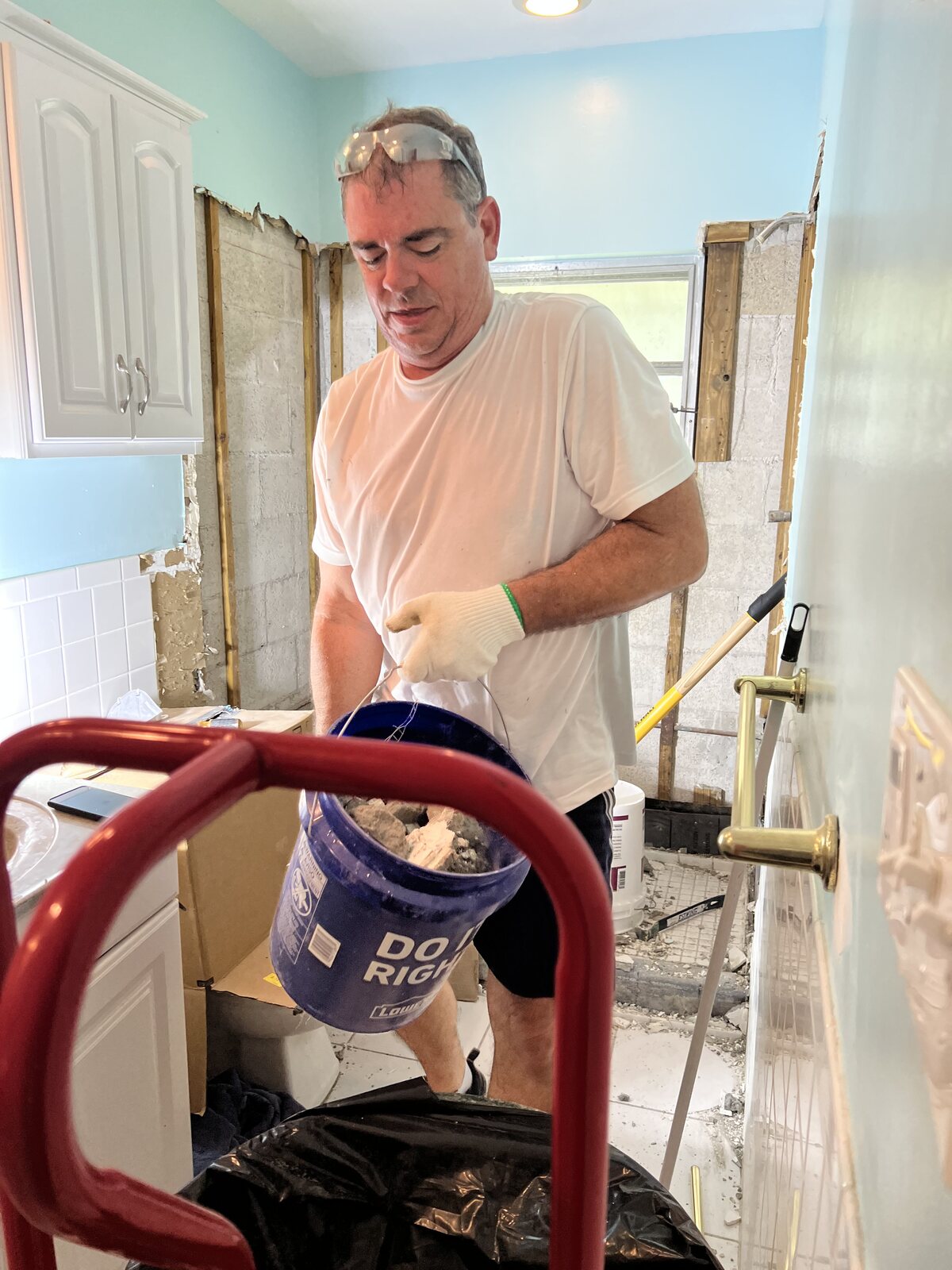 John working during the bathroom renovation